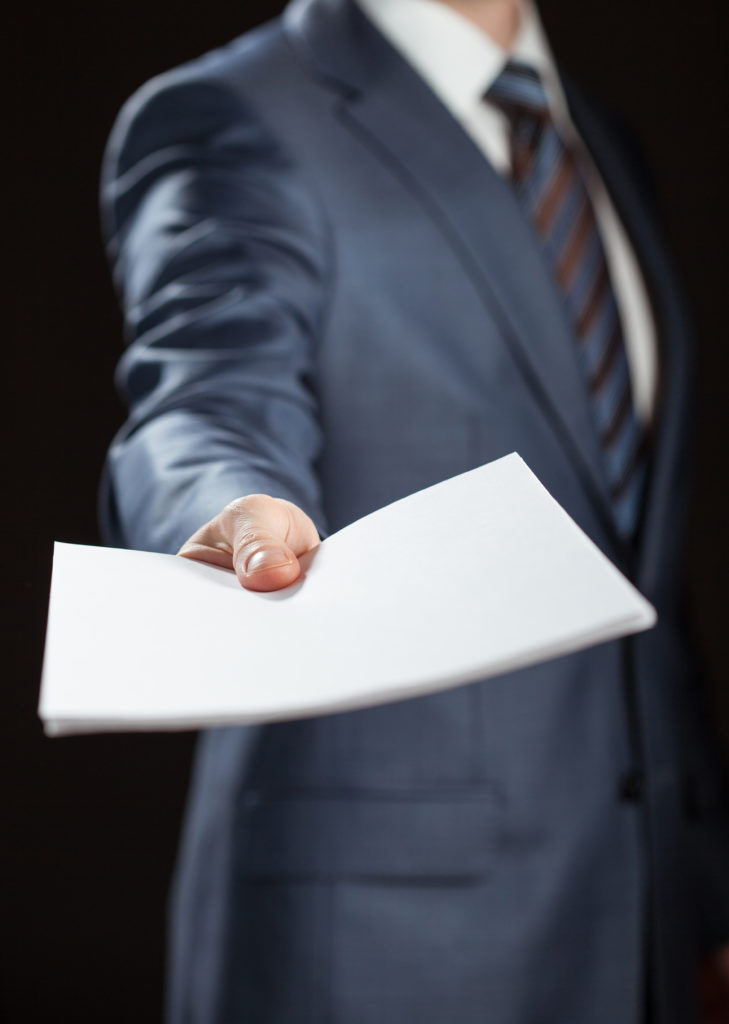 Businessman giving documents to you - Astana Sunrai